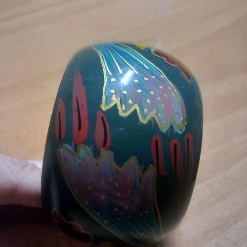 Wooden bracelet used with painted design
