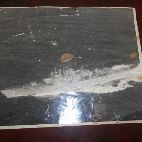 U.S.A warship used with crew members' signatures on the back