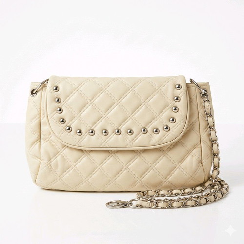 Women's shoulder bag like new, milky color with silver details