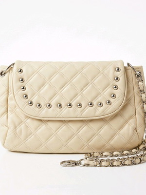 Women's shoulder bag like new, milky color with silver details