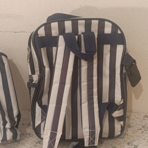 Insulated backpack with bottle holder like new, black and white striped