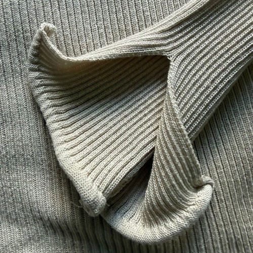 Zini sweater with high turned collar in cream color like new