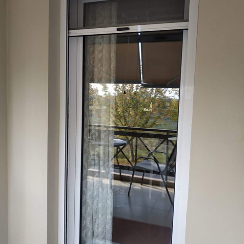 Aluminum window frames with shutters and double glazing