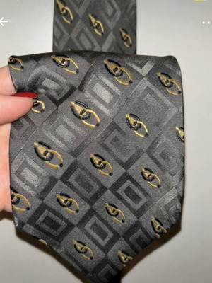 Calvin Klein men's silk tie like new, gray and gold