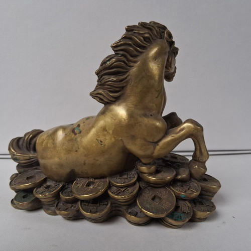 Bronze horse sculpture used, vintage wealth symbol on coins