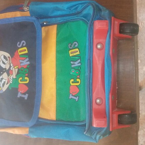 Vintage school bag used with wheels and compartment