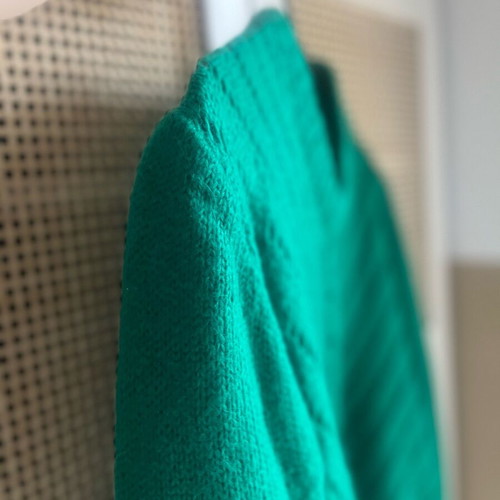Wool knitted women's green sweater like new with V-neck