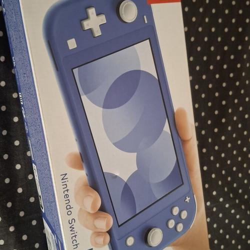 Nintendo Switch Lite like new with gift cases