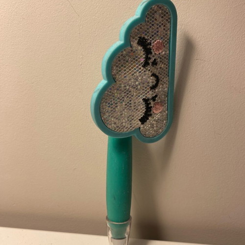 Pen used with cloud design in blue color