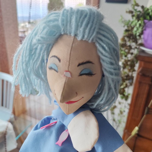 Handmade doll for collectors or puppet theatre on wooden base