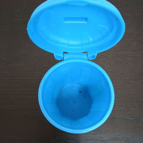 Small blue bin for kids' desk used