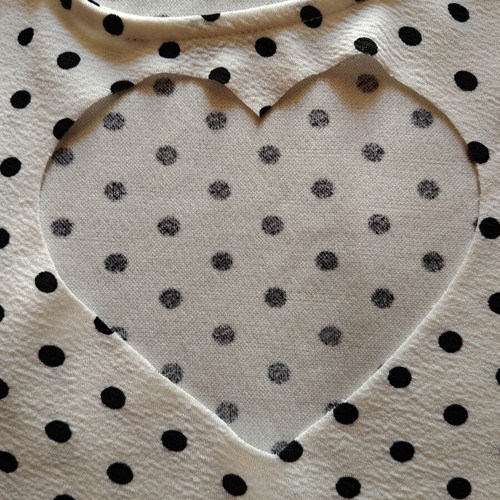Women's polka dot short sleeve top with heart cutout like new, size M
