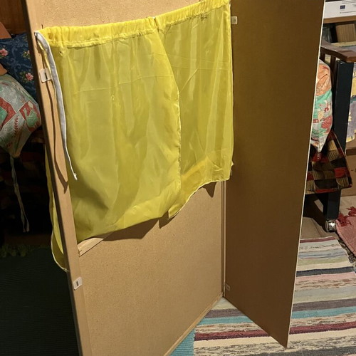 Used puppet theater with wear and missing support side