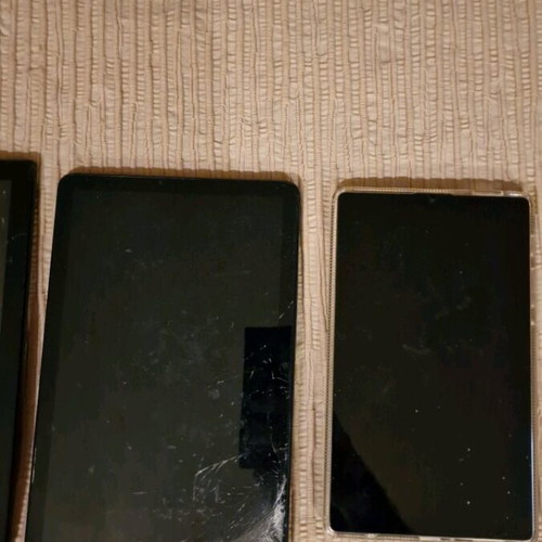 Various tablets used with damages for spare parts