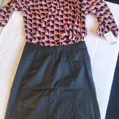 Attrattivo leather skirt like new, black, elastic midi or mini