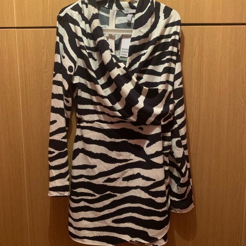 Clothes like new, dresses, vest, blouse, skirts and skirt-shorts