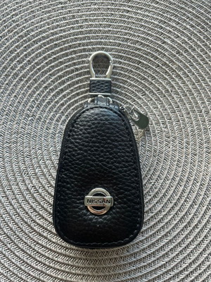 Nissan leather car key case new, black with metal details