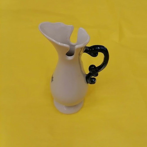 Vintage porcelain decorative mini jug with embossed roses like new