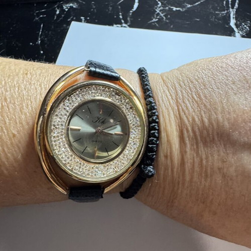 Wristwatch with rhinestones, black and gold