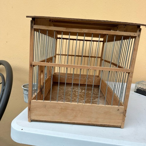 Wooden birdcage used for canaries or small birds