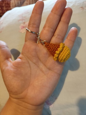 Ice Cream Keychain new, banana flavor, brown and yellow