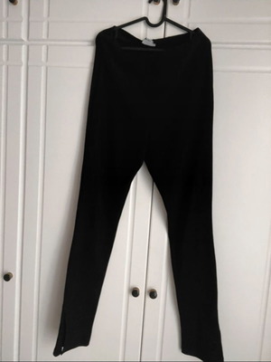 Assos black pants like new with slit at the edge