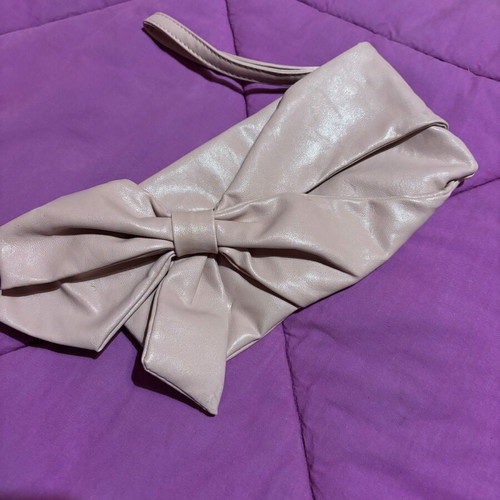 Clutch bag hand-held like new, pink with bow design