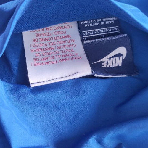Nike lightweight double face jacket used with pocket damage