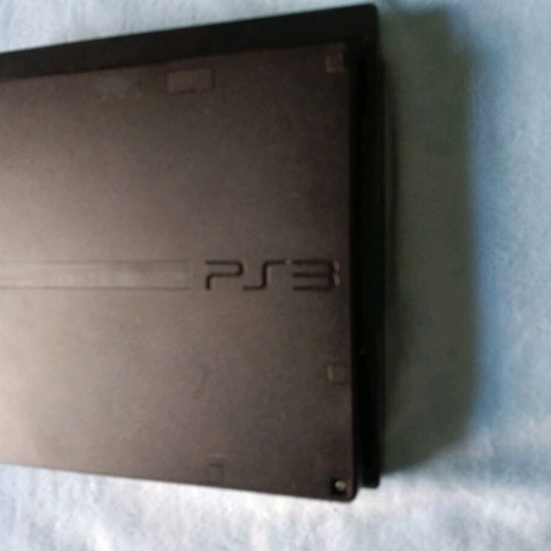 PlayStation 3 (PS3) like new with cable, controller and Assassin's Creed II