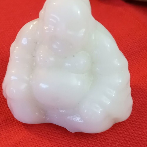 Alabaster-style miniature Buddha, smiling