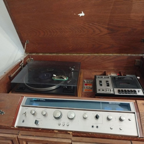 Handmade console with used acoustic equipment