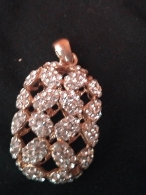 Pendant gold color with rhinestones like new, 4x3 cm