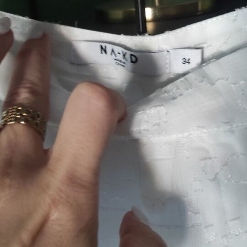 Naked shorts XS new, white, high-waisted with iridescent fabric