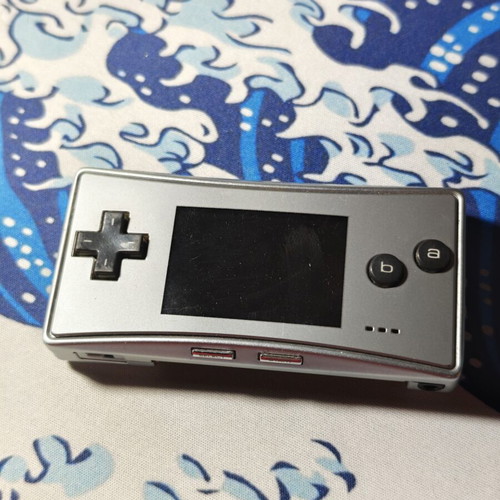 Gameboy Micro with new 2300mAh battery and USB charger