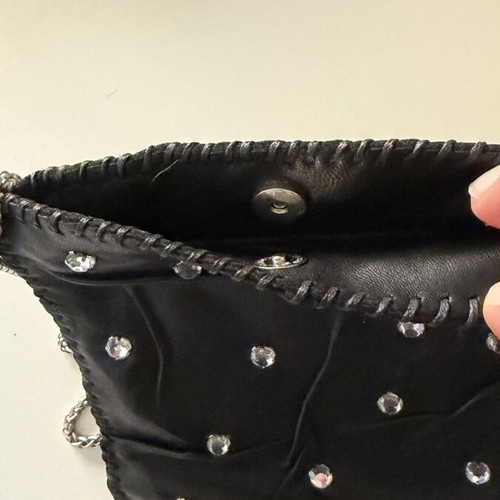 Women's leather crossbody bag like new with rhinestones and double chain