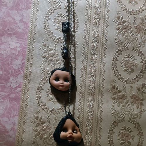 Gothic handmade necklace custom made with old doll heads