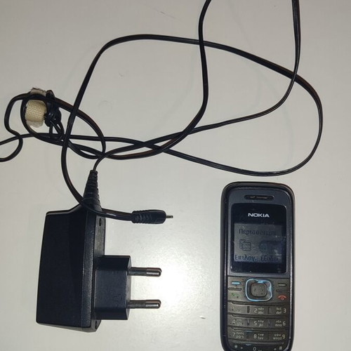 Nokia 1208 used with original charger, black
