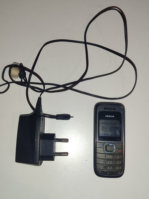 Nokia 1208 used with original charger, black