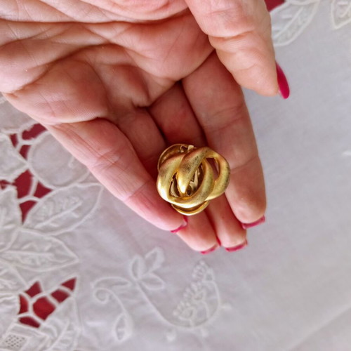 Clip-on earrings used, relief design, bronze tone