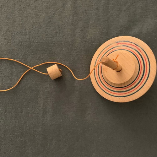 Wooden spinning top like new in excellent condition
