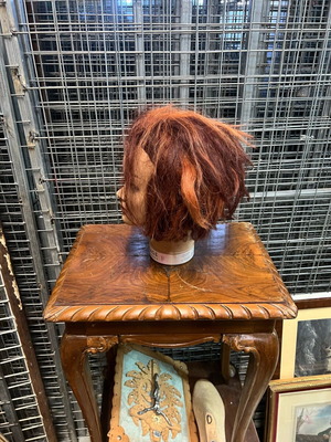 Hairdressing doll head used with wear
