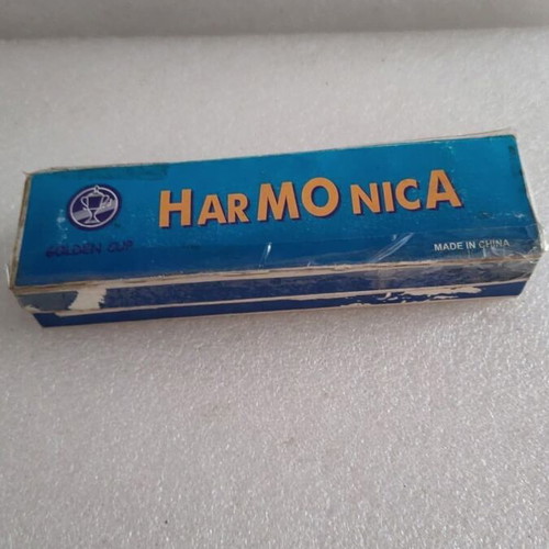 Harmonica vintage used in its box