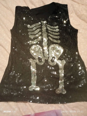 Carnival sleeveless top with skeleton design like new, one size