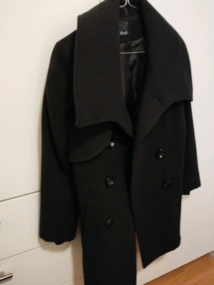 Black Ysatis coat small to medium knee-length like new
