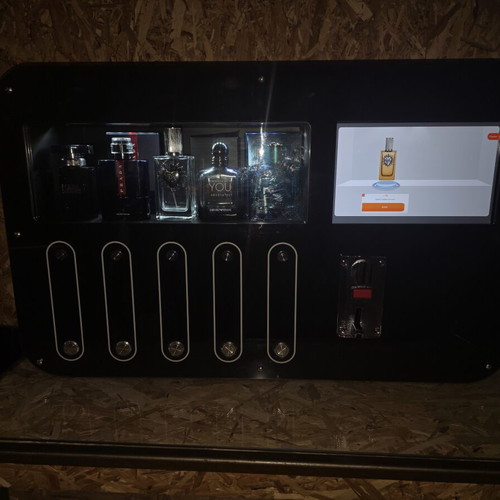 Automatic perfume vending machine with touchscreen and coin acceptor