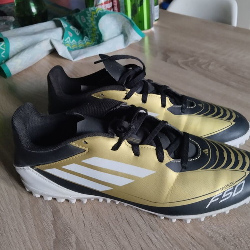 Adidas Messi football shoes, black and gold