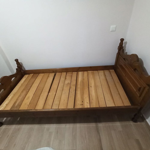 Wooden bed used, 2 meters long, 1 meter wide