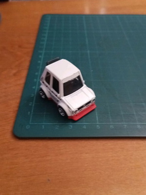 Hot Wheels Tooned VW Golf Mk1 μεταλλικό αυτοκινητάκι σε λευκό