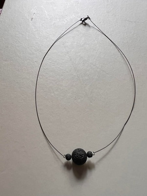 Necklace with volcanic stone like new, handmade, black wire