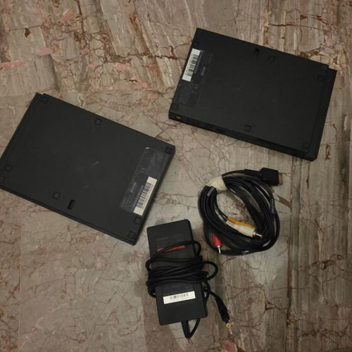 PlayStation 2 (PS2) consoles for parts used, pack of 2